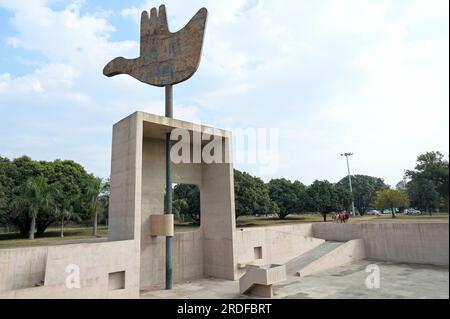 INDIA, Chandigarh, the master plan of the city divided in sectors was prepared by swiss-french architect Le Corbusier in the 1950` , Sector 1 Capitol complex, metal and concrete monument The Open Hand designed by Le Corbusier, symbolizes 'the hand to give and the hand to take; peace and prosperity, and the unity of mankind' Stock Photo